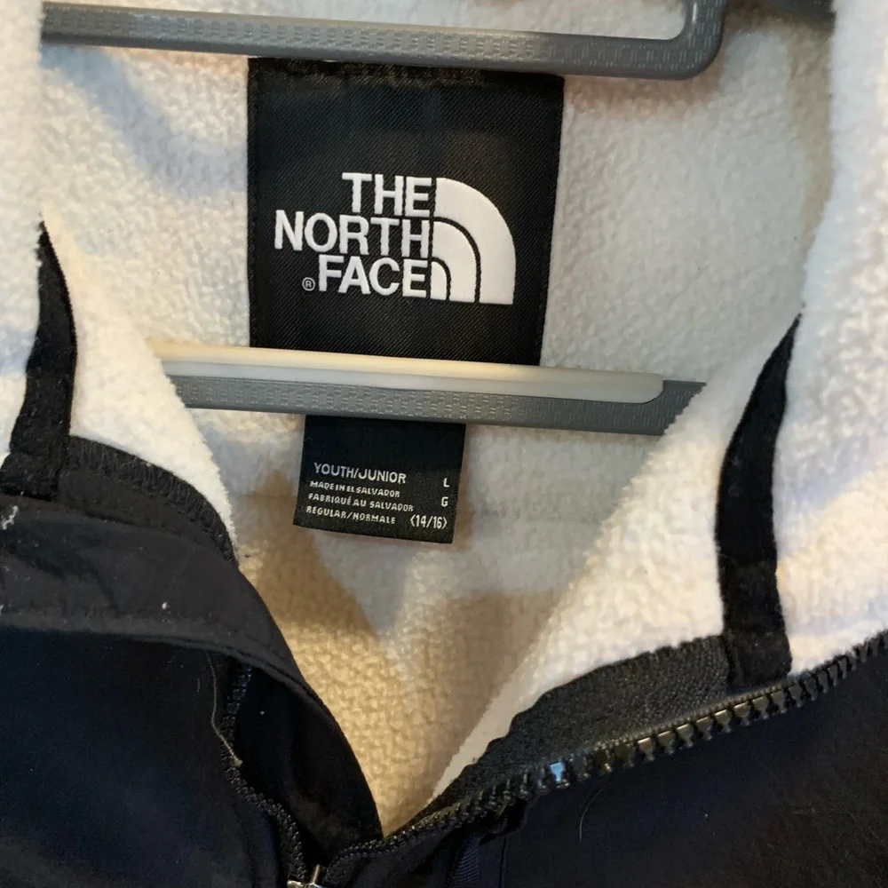 The North Face Black and White Jacket
Size Youth Large - Picture 7 of 8